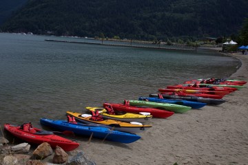 row of kayaks
